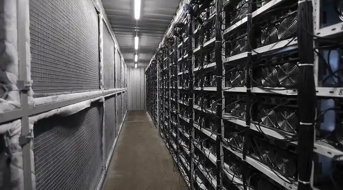 A vast mining farm filled with rows of ASIC miners, showcasing the scale of industrial Bitcoin mining.